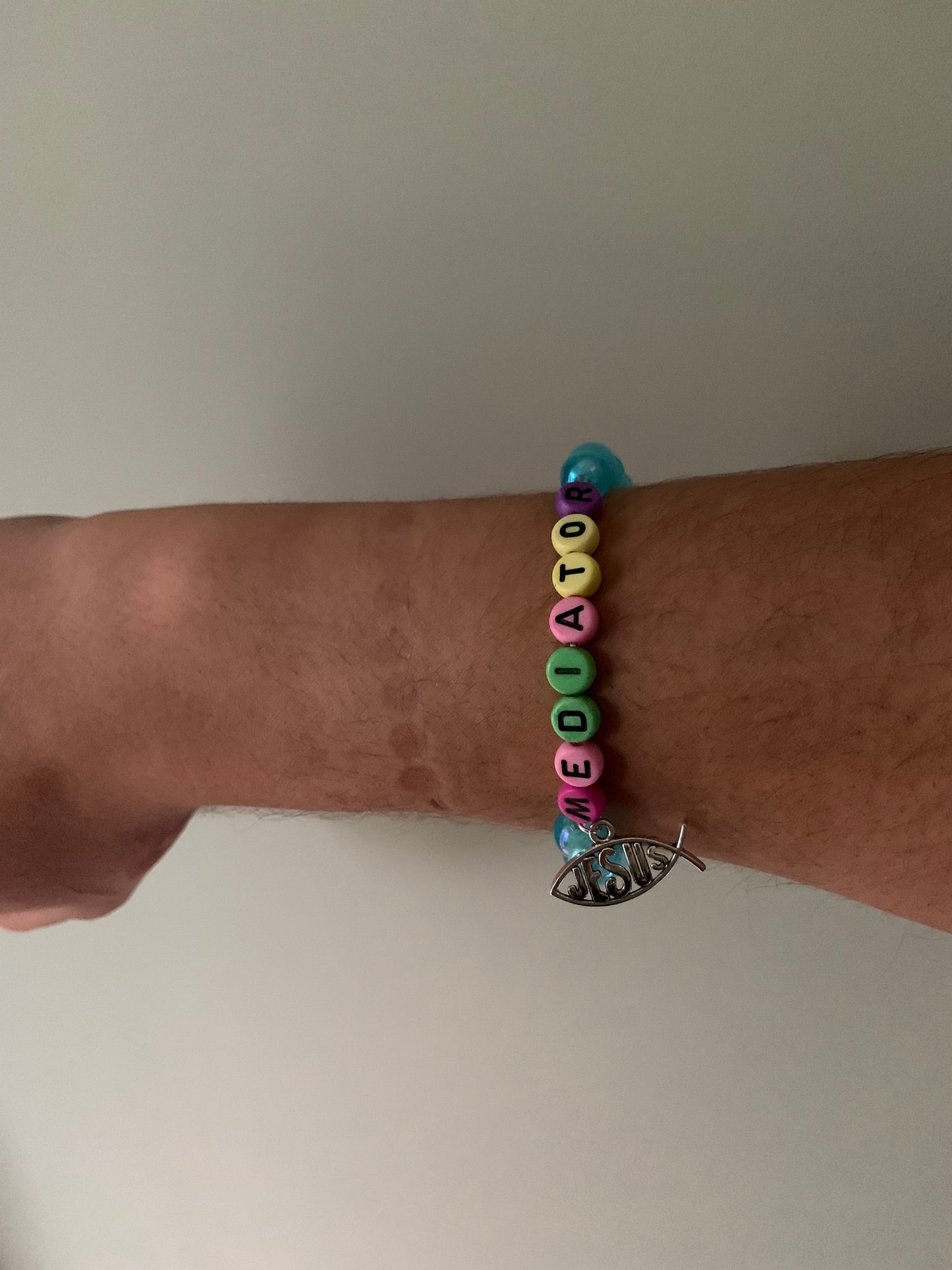 Beaded mediator charm bracelet