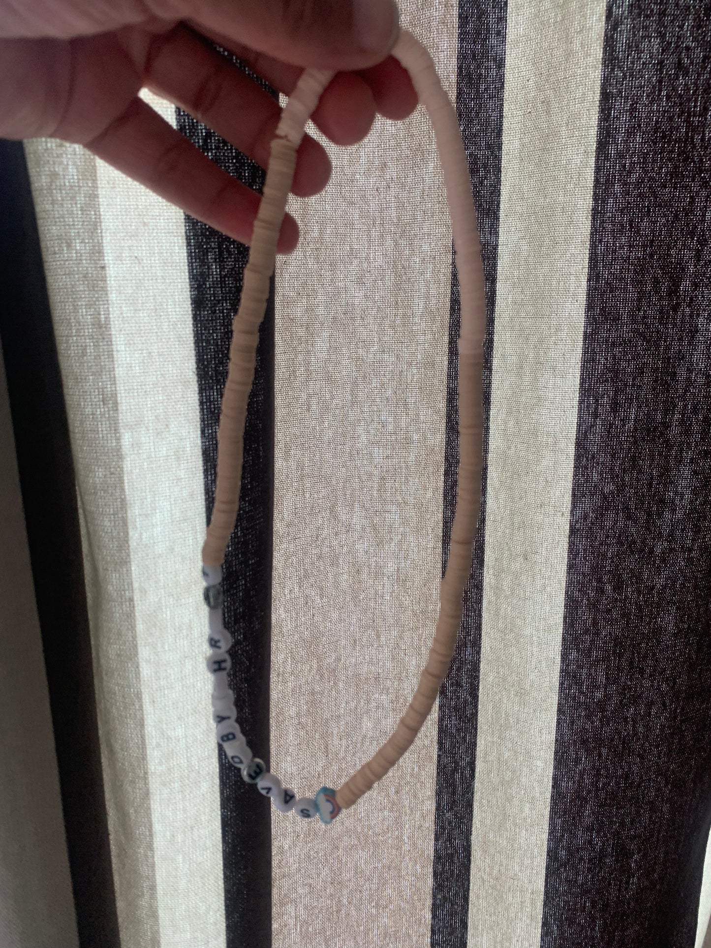 Saved by Christ clay beaded elastic necklace