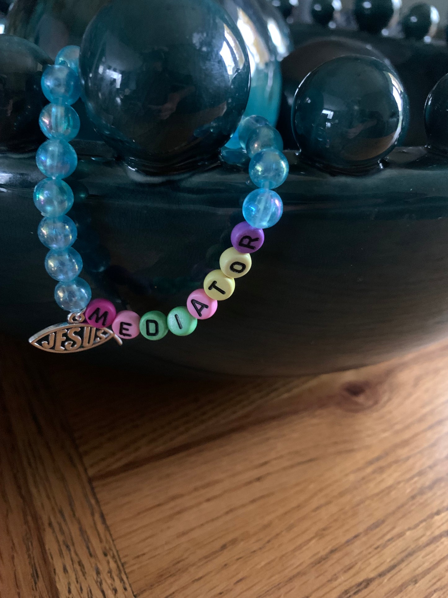 Beaded mediator charm bracelet